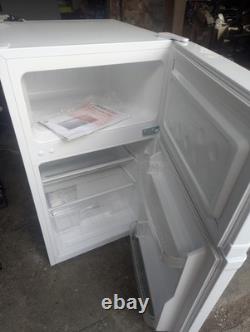 Essentials under counter fridge freezer model CUC50W20. Around 3 Years Old