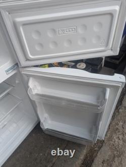 Essentials under counter fridge freezer model CUC50W20. Around 3 Years Old