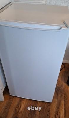New condition, used for fue days, essentials CUL50W20 under counter fridge