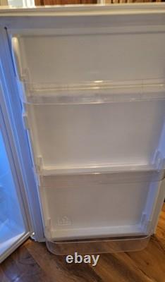 New condition, used for fue days, essentials CUL50W20 under counter fridge